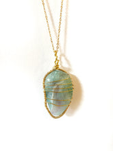 Load image into Gallery viewer, Fluorite Wire-Wrapped Brass Pendant Necklace. Genuine Real Raw Crystal Gemstone Sourced in Asheville, North Carolina. Pale teal or soft blue-green color. Minimalist Modern Bohemian Style Design. Authentic One-of-a-Kind Handmade Jewelry.