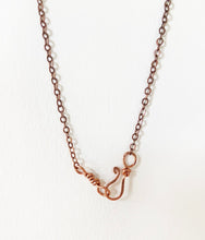 Load image into Gallery viewer, Pale Light Lime Green Calcite Wire-Wrapped Copper Pendant Necklace. Genuine Real Raw Crystal Gemstone Sourced in Asheville, North Carolina. Minimalist Modern Bohemian Style with Criss-Cross X Design. Authentic One-of-a-Kind Handmade Jewelry.