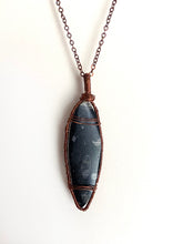 Load image into Gallery viewer, Ancient Orthoceras Fossial & Wire-Wrapped Antique Copper Pendant Necklace. Genuine Real Oblong Black Gemstone Sourced in Asheville, North Carolina. Minimalist Modern Bohemian Style Design. Authentic One-of-a-Kind Handmade Jewelry.