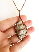 Load image into Gallery viewer, White Quartz & Mica Wire-Wrapped Copper Pendant Necklace. Genuine Real Raw Crystal Gemstone. Foraged Rock Found on a Hike near Asheville in Western North Carolina. Minimalist Modern Bohemian Style with Criss Cross X Design. Authentic One-of-a-Kind Handmade Jewelry.