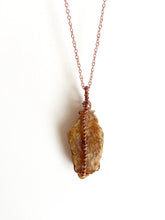 Load image into Gallery viewer, Orange Aventurine Quartz Wire-Wrapped Copper Pendant Necklace. Genuine Real Raw Crystal Gemstone. Foraged Rock Found on a Hike near Asheville in Western North Carolina. Minimalist Modern Bohemian Style with Circle Design. Authentic One-of-a-Kind Handmade Jewelry.