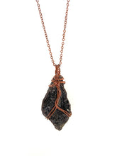 Load image into Gallery viewer, Black Pyroxenite Wire-Wrapped Antique Copper Pendant Necklace. Genuine Real Raw Crystal Gemstone. Foraged Rock Found on a Hike near Asheville in Western North Carolina. Minimalist Modern Bohemian Style with Circle Design. Authentic One-of-a-Kind Handmade Jewelry.