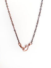 Load image into Gallery viewer, Black Pyroxenite Wire-Wrapped Antique Copper Pendant Necklace. Genuine Real Raw Crystal Gemstone. Foraged Rock Found on a Hike near Asheville in Western North Carolina. Minimalist Modern Bohemian Style with Circle Design. Authentic One-of-a-Kind Handmade Jewelry.