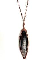 Load image into Gallery viewer, Ancient Orthoceras Fossial & Wire-Wrapped Antique Copper Pendant Necklace. Genuine Real Oblong Black Gemstone Sourced in Asheville, North Carolina. Minimalist Modern Bohemian Style Design. Authentic One-of-a-Kind Handmade Jewelry.
