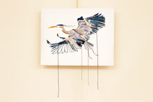 Load image into Gallery viewer, 11” x 14" original hand embroidery on canvas. Expressive flying great blue heron fiber art, in an intricate, meticulous, loose, sketch-like, minimalist, modern style with loose hanging threads by contemporary fine artist Elizabeth Becker. Monochromatic dark blue, gray and white colors.