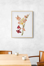 Load image into Gallery viewer, 18" x 24" original watercolor botanical gladiolus floral bouquet painting in an expressive, abstract, minimalist, modern, loose, watery style by contemporary fine artist Elizabeth Becker. Tranquil, serene, calming, peaceful wall art. Soft peach, pale yellow, muted maroon red and olive green colors with white background. Framed in dining room.
