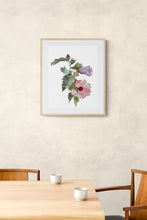 Load image into Gallery viewer, 16” x 20” original watercolor botanical hibiscus floral painting in an expressive, impressionist, minimalist, modern style by contemporary fine artist Elizabeth Becker. Soft muted pink, purple, dark green and white colors. Framed in a dining room.