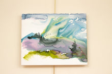 Load image into Gallery viewer, 16” x 20" original watercolor painting on canvas. Abstract landscape of foggy misty mountain forest with pine trees and flying birds in an expressive, impressionist, loose, watery, ethereal, minimalist, modern style by contemporary fine artist Elizabeth Becker. Blue, green and purple iridescent jewel tones