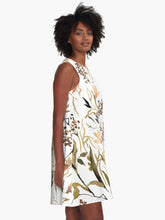 Load image into Gallery viewer, A-line or swing dress featuring original hand-painted watercolor painting by artist Elizabeth Becker. Minimal modern flowy summer tent dress with floral design. Soft peach, black, olive green and white colors. Loose expressive botanical wildflowers.