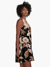 Load image into Gallery viewer, A-line or swing dress featuring original hand-painted watercolor painting by artist Elizabeth Becker. Minimal modern flowy summer tent dress with floral design. Soft sepia, sand and neutral tan brown on black background. Loose expressive botanical rose flowers and leaves.
