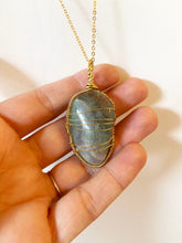 Load image into Gallery viewer, Fluorite Wire-Wrapped Brass Pendant Necklace. Genuine Real Raw Crystal Gemstone Sourced in Asheville, North Carolina. Pale teal or soft blue-green color. Minimalist Modern Bohemian Style Design. Authentic One-of-a-Kind Handmade Jewelry.
