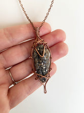 Load image into Gallery viewer, Black Mica (Biotite) Wire-Wrapped Copper Pendant Necklace. Genuine Real Raw Rough Uncut Sparkling Crystal Gemstone. Foraged Rock Found on a Hike near Asheville in Western North Carolina. Minimalist Modern Bohemian Style Design. Authentic One-of-a-Kind Handmade Jewelry.
