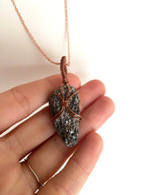 Load image into Gallery viewer, Black Mica (Biotite) Wire-Wrapped Copper Pendant Necklace. Genuine Real Raw Rough Uncut Sparkling Crystal Gemstone. Foraged Rock Found on a Hike near Asheville in Western North Carolina. Minimalist Modern Bohemian Style Design. Authentic One-of-a-Kind Handmade Jewelry.
