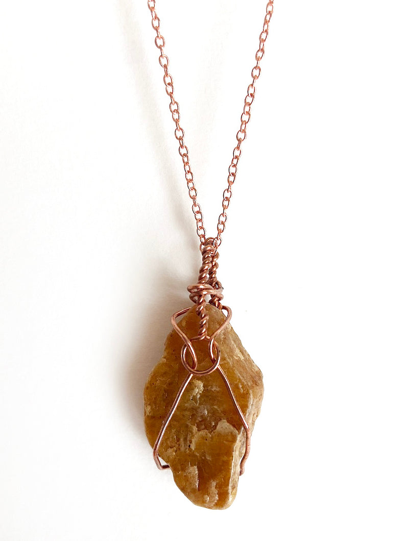 Orange Aventurine Quartz Wire-Wrapped Copper Pendant Necklace. Genuine Real Raw Crystal Gemstone. Foraged Rock Found on a Hike near Asheville in Western North Carolina. Minimalist Modern Bohemian Style with Circle Design. Authentic One-of-a-Kind Handmade Jewelry.