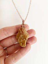 Load image into Gallery viewer, Orange Aventurine Quartz Wire-Wrapped Copper Pendant Necklace. Genuine Real Raw Crystal Gemstone. Foraged Rock Found on a Hike near Asheville in Western North Carolina. Minimalist Modern Bohemian Style with Circle Design. Authentic One-of-a-Kind Handmade Jewelry.
