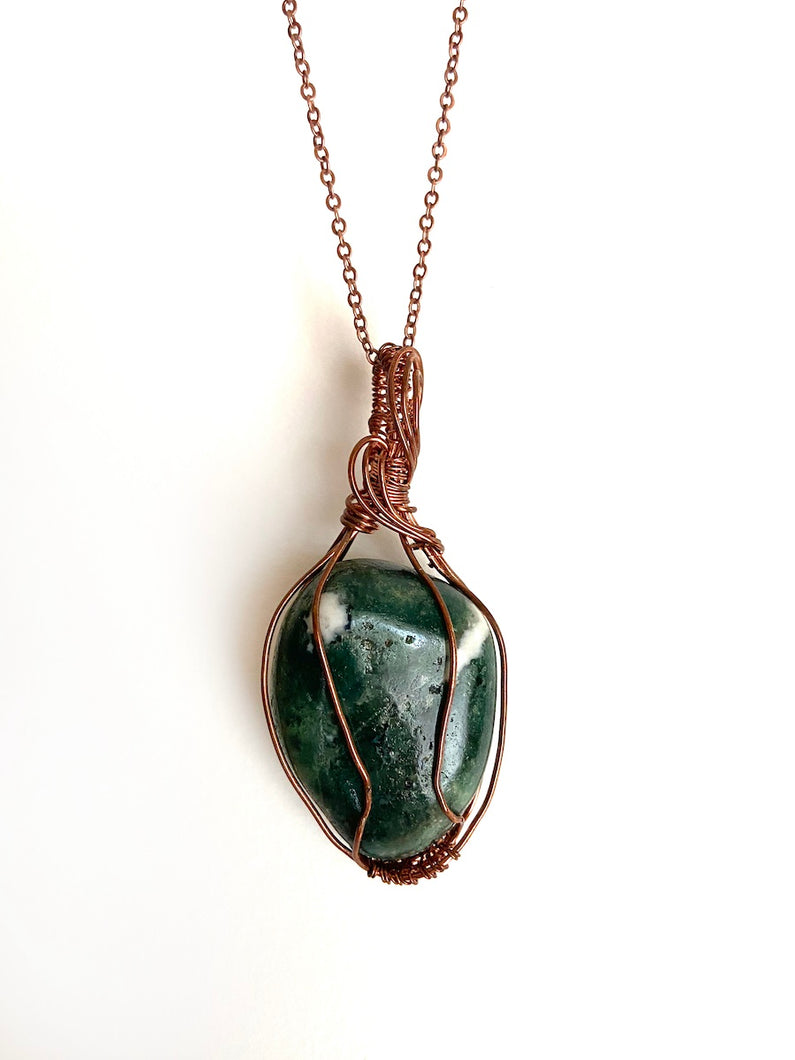 Green Jasper Wire-Wrapped Antique Copper Pendant Necklace. Genuine Real Raw Crystal Gemstone Sourced in Asheville, North Carolina. Minimalist Modern Bohemian Style with Swirl or Swoop Design. Authentic One-of-a-Kind Handmade Jewelry.