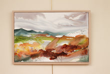 Load image into Gallery viewer, 24” x 36&quot; original watercolor painting on canvas in 26&quot; x 38&quot; natural maple solid wood floater frame. Abstract autumnal or fall landscape of foggy misty mountain layers with flying birds in an expressive, impressionist, loose, watery, flowing, ethereal, minimalist, modern, moody style by contemporary fine artist Elizabeth Becker. Inspired by Asheville, North Carolina or Colorado. Dark red, rust, burnt orange, olive green, rust orange, teal blue, gray and white colors.
