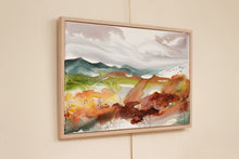 Load image into Gallery viewer, 24” x 36&quot; original watercolor painting on canvas in 26&quot; x 38&quot; natural maple solid wood floater frame. Abstract autumnal or fall landscape of foggy misty mountain layers with flying birds in an expressive, impressionist, loose, watery, flowing, ethereal, minimalist, modern, moody style by contemporary fine artist Elizabeth Becker. Inspired by Asheville, North Carolina or Colorado. Dark red, rust, burnt orange, olive green, rust orange, teal blue, gray and white colors.
