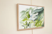 Load image into Gallery viewer, 24” x 36&quot; original watercolor painting on canvas in 26&quot; x 38&quot; natural maple solid wood floater frame. Large-scale expressive flying bird, white egret, crane or water bird in marsh. Expressive, impressionist, loose, watery, flowing, ethereal, minimalist, modern, moody style by contemporary fine artist Elizabeth Becker. Animal with loose abstract painterly drips. Monochromatic olive green, blue-green, dark turquoise, teal and white colors.
