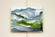 Load image into Gallery viewer, 16” x 20&quot; original watercolor painting on canvas. Abstract appalachian landscape of mountain layers in an expressive, impressionist, loose, watery, ethereal, minimalist, modern style by contemporary fine artist Elizabeth Becker. Inspired by Asheville, North Carolina or Colorado. Monochromatic muted blue, green and white colors.
