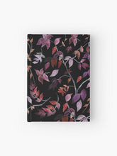 Load image into Gallery viewer, Hardcover journal featuring original hand-painted watercolor painting by artist Elizabeth Becker. Ruled line, graph or blank pages. Red and purple on black background. Botanical leaves, tree branches and vines.
