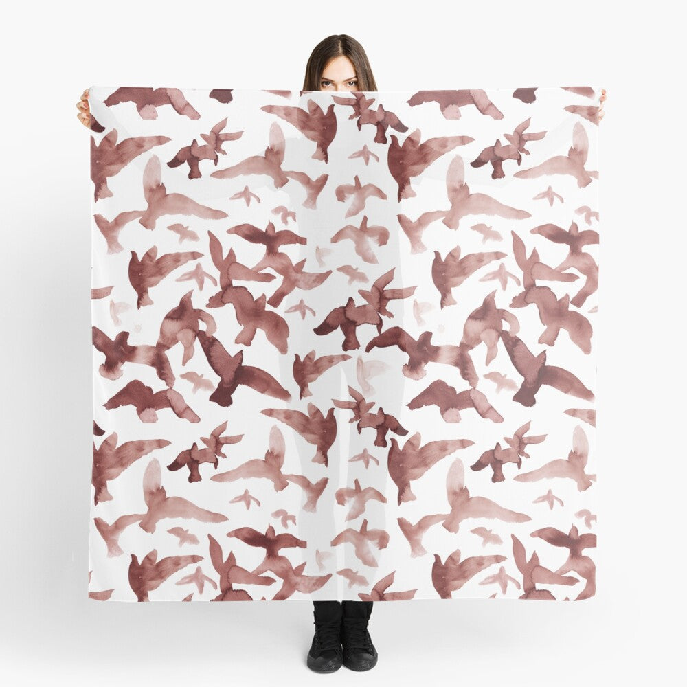 Scarf featuring original hand-painted watercolor painting by artist Elizabeth Becker. Maroon red and white flying birds design.