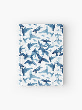 Load image into Gallery viewer, Hardcover journal featuring original hand-painted watercolor painting by artist Elizabeth Becker. Ruled line, graph or blank pages. Blue and white colors. Flying birds design.
