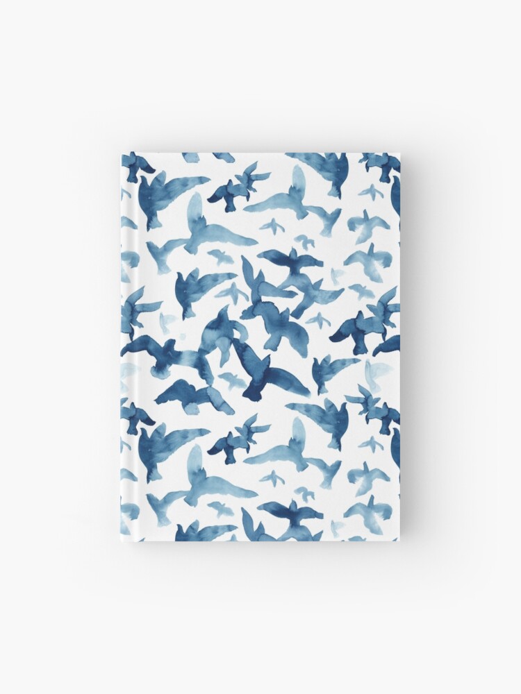 Hardcover journal featuring original hand-painted watercolor painting by artist Elizabeth Becker. Ruled line, graph or blank pages. Blue and white colors. Flying birds design.