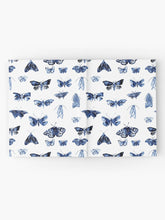 Load image into Gallery viewer, Hardcover journal featuring original hand-painted watercolor painting by artist Elizabeth Becker. Ruled line, graph or blank pages. Blue and white colors. Vintage moth or butterfly pattern. Insects design. 
