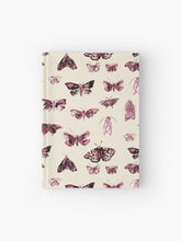 Load image into Gallery viewer, Hardcover journal featuring original hand-painted watercolor painting by artist Elizabeth Becker. Ruled line, graph or blank pages. Burgundy, maroon red and cream colors. Vintage moth or butterfly pattern. Insects design. 
