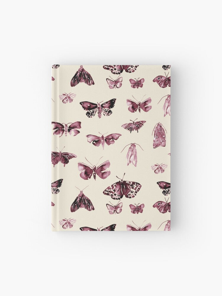 Hardcover journal featuring original hand-painted watercolor painting by artist Elizabeth Becker. Ruled line, graph or blank pages. Burgundy, maroon red and cream colors. Vintage moth or butterfly pattern. Insects design. 