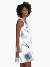 Load image into Gallery viewer, A-line or swing dress featuring original hand-painted watercolor painting by artist Elizabeth Becker. Minimal modern flowy summer tent dress with floral design. Soft blue, muted green and white colors. Loose expressive botanical iris flowers.
