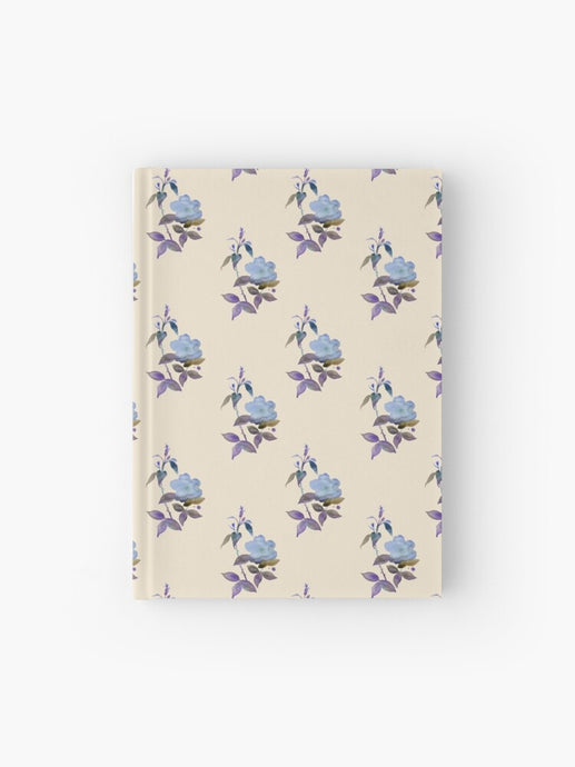 Hardcover journal featuring original hand-painted watercolor painting by artist Elizabeth Becker. Ruled line, graph or blank pages. Light blue and soft purple colors on cream background. Botanical rose flowers and leaves. Vintage floral pattern design.