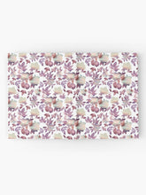 Load image into Gallery viewer, Hardcover journal featuring original hand-painted watercolor painting by artist Elizabeth Becker. Ruled line, graph or blank pages. Mauve purple, pale peach and white colors. Floral rose flowers and leaves.
