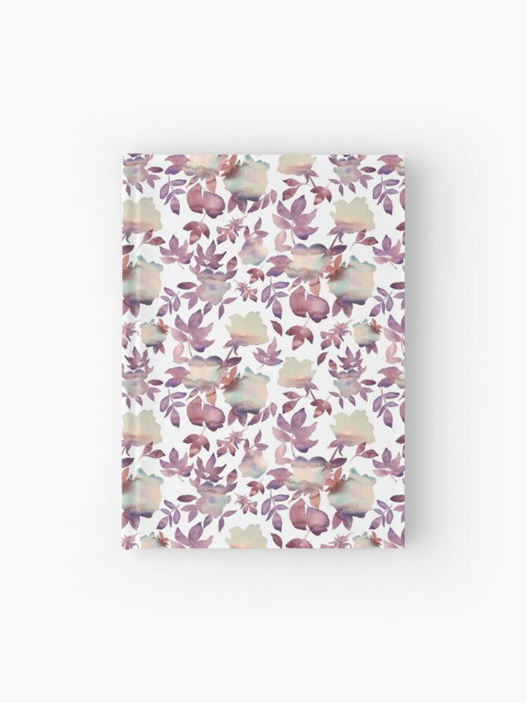 Hardcover journal featuring original hand-painted watercolor painting by artist Elizabeth Becker. Ruled line, graph or blank pages. Mauve purple, pale peach and white colors. Floral rose flowers and leaves.