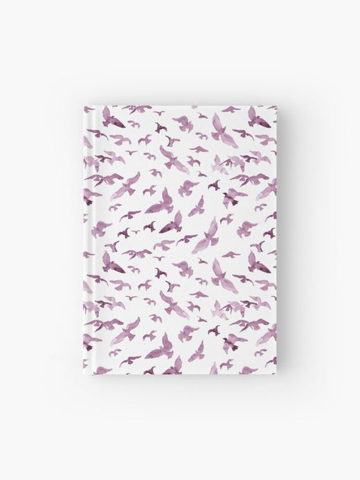 Hardcover journal featuring original hand-painted watercolor painting by artist Elizabeth Becker. Ruled line, graph or blank pages. Fuchsia pink, purple and white colors. Flying birds design.