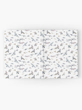 Load image into Gallery viewer, Hardcover journal featuring original hand-painted watercolor painting by artist Elizabeth Becker. Ruled line, graph or blank pages. Soft gray, light blue, pale mauve and white colors. Flying birds design.
