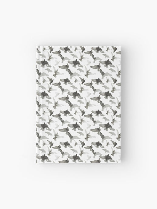 Hardcover journal featuring original hand-painted watercolor painting by artist Elizabeth Becker. Ruled line, graph or blank pages. Monochromatic gray, black and white. Flying birds design.